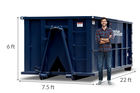 Man Standing in Front of Dumpster With Dimensions