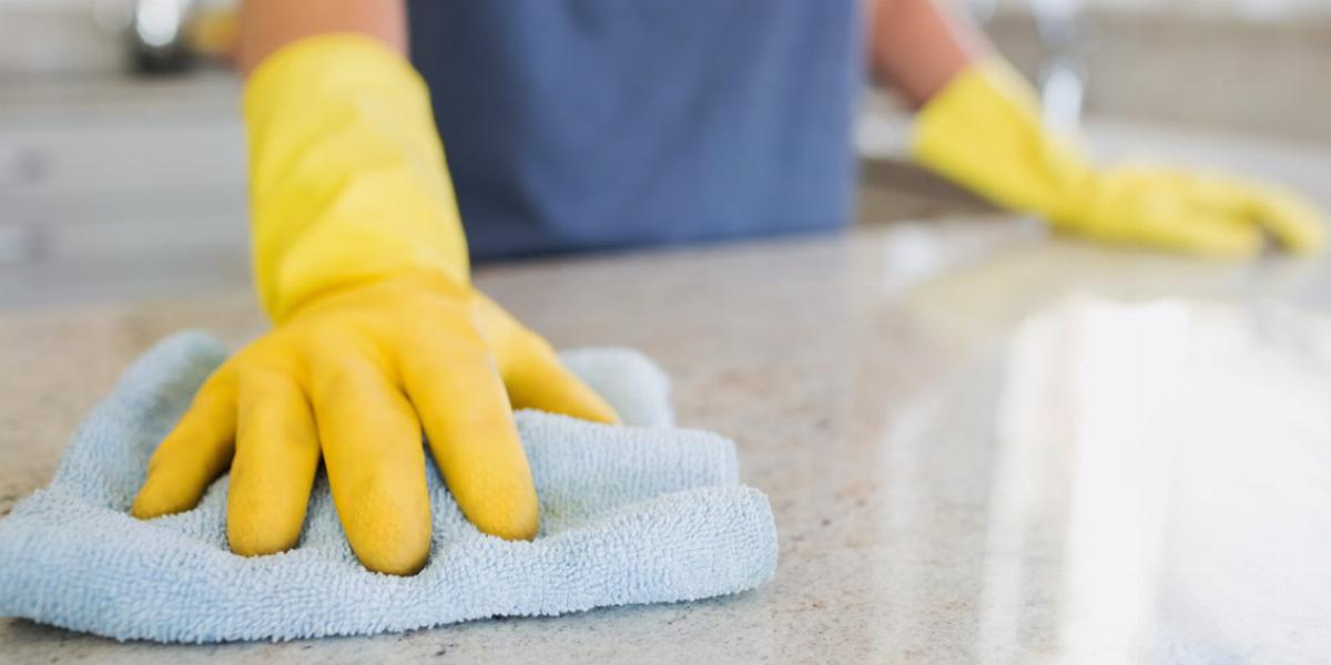 Spring cleaning kitchen countertops.