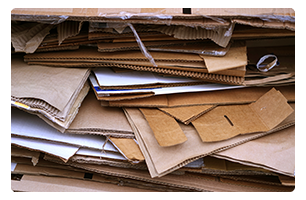 Unkempt stack of cardboard.