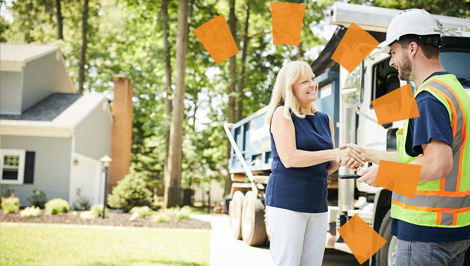 Dumpsters.com driver shaking hand with homeowner