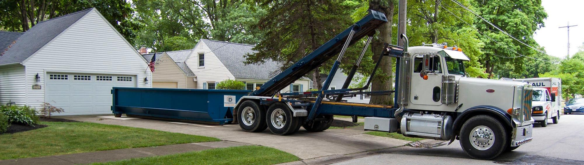 Roll off dumpster delivery.