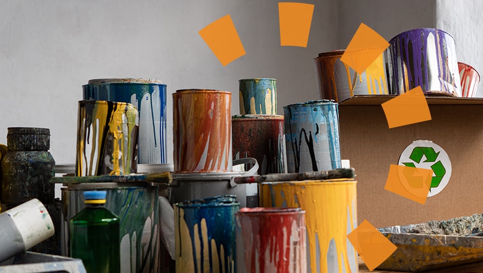 A stack of partially used paint cans.