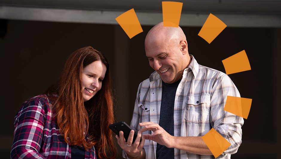 Man and Woman Ordering a Dumpster on Their Phone