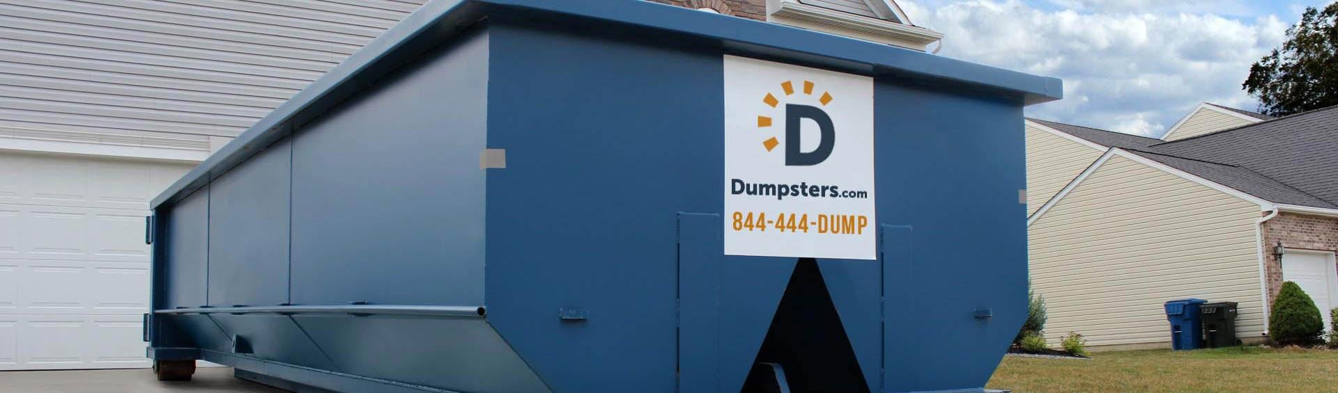 roll off dumpster in residential driveway