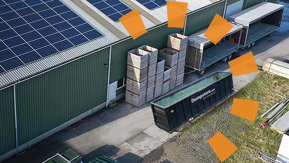 A Dumpsters.com roll off dumpster sitting next to a large facility covered in solar panels.