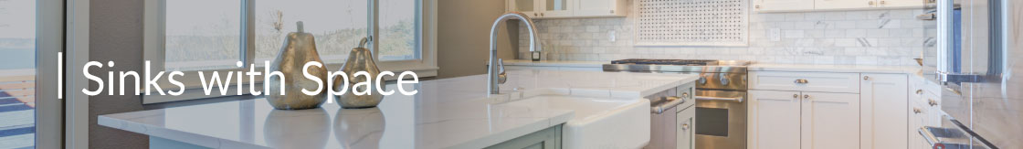 A modern kitchen with a large farmhouse sink 